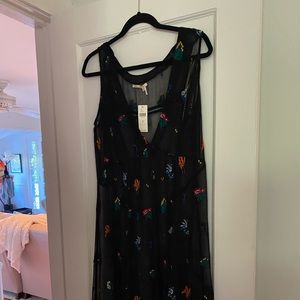 Dress with slip from anthropology. Never wore. Original tag still on it